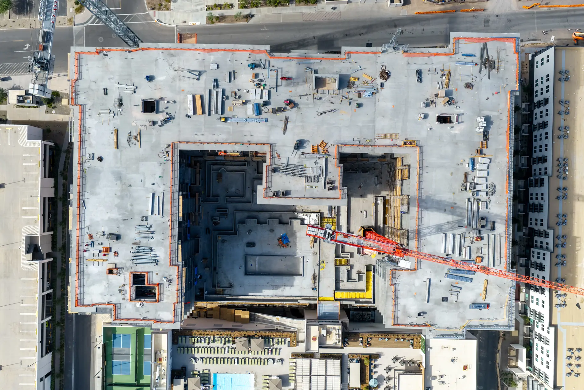 Top-down aerial of the same site with the completed concrete structure